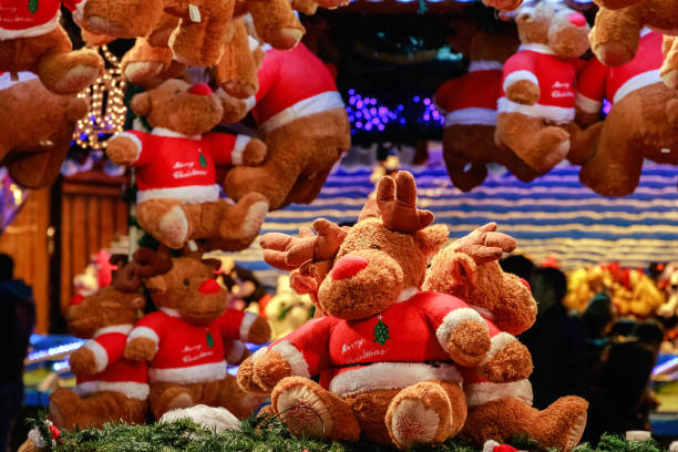 istock Plush Reindeers in a Christmas Fair 638510616
