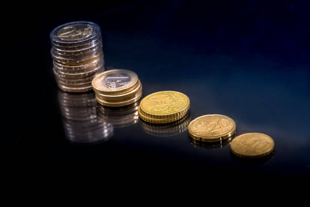 istock Concept of stacks Euro Coins isolated on black background. 638510722