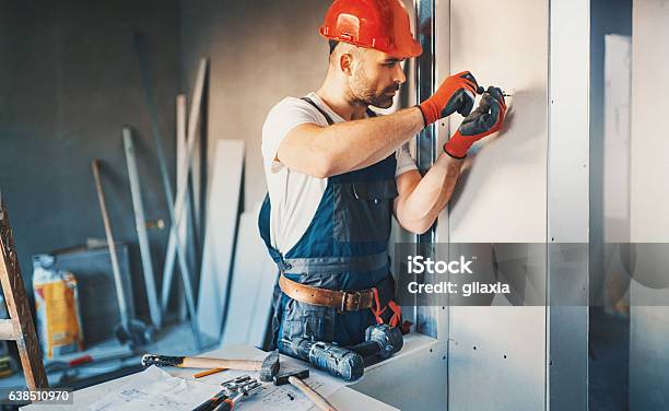 Construction Worker Routine Stock Photo - Download Image Now - Drywall, Screwdriver, Drill