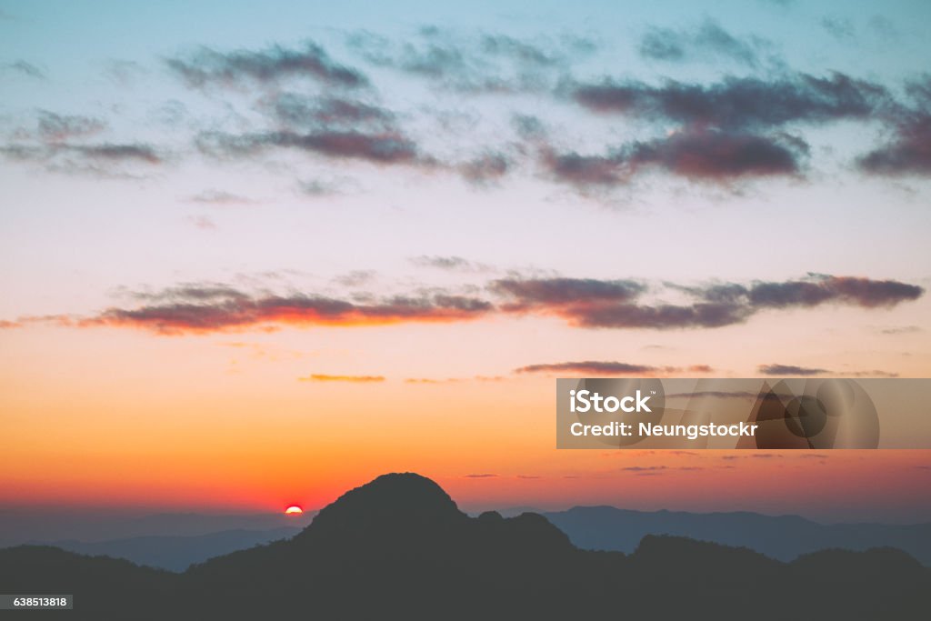 sunset and big mountain Backgrounds Stock Photo