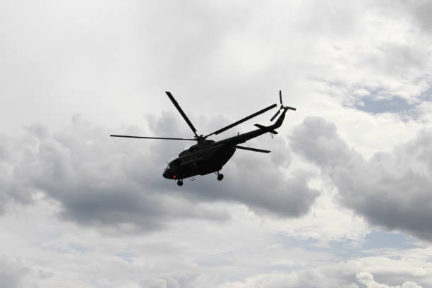istock Helicopter flying against the sky 638513840