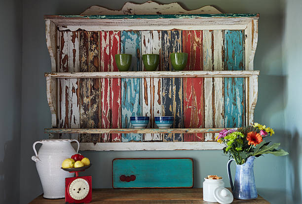 Neat as a pin Shot of a counter with objects arranged on it in a country kitchen vintage kitchen scale with fruit stock pictures, royalty-free photos & images