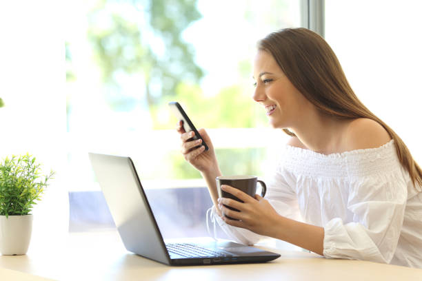istock Girl reading message in a mobile phone 638521250