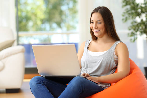 istock Housewife using a laptop at home 638521296