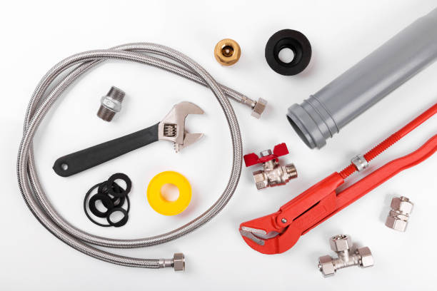 istock plumbing tools and equipment on white. top view 638522918