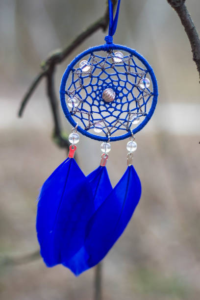 istock Dreamcatcher made of feathers, leather, beads, and ropes 638523502