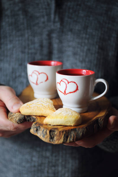 istock Valentine's Day: two cups of coffee and cookies 638525504