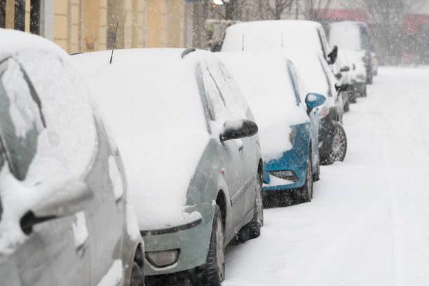 istock Parked cars covered with snow 638525768