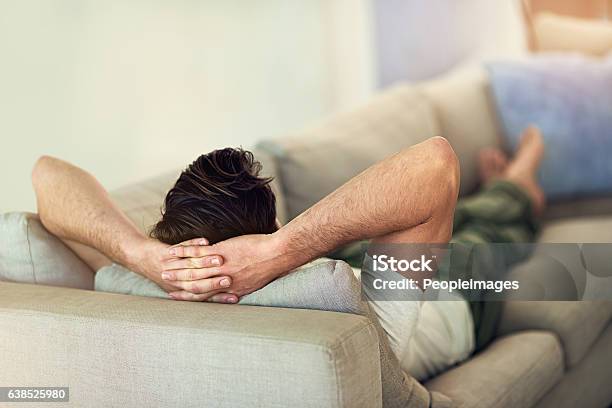 Feet Up Wind Down Stock Photo - Download Image Now - Men, Sofa, Laziness