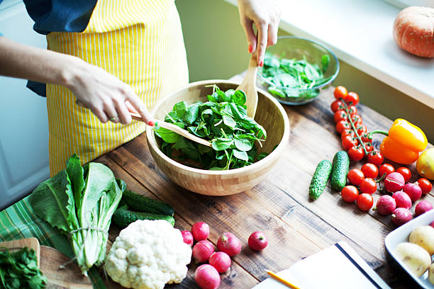 Fresh vegetables Woman cooking chopping food photos stock pictures, royalty-free photos & images