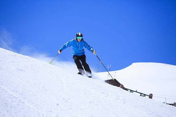 istock Ski Active senior men snow skier skiing Sunny ski resorts 638528786