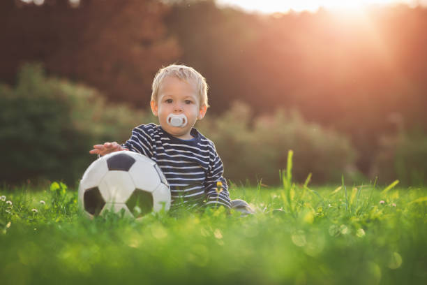 istock Toddler and the ball 638528854