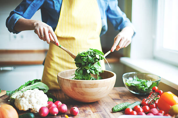 Fresh vegetables Woman cooking chopping food photos stock pictures, royalty-free photos & images