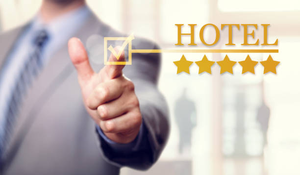 five stars luxury hotel accommodation and service - first class star shape rank gold imagens e fotografias de stock