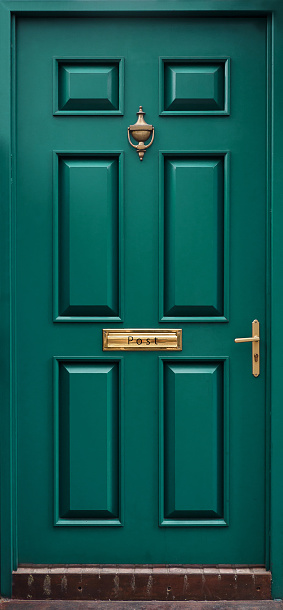 Classic green door isolated