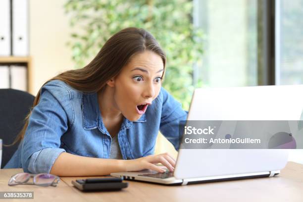 Amazed Entrepreneur Working On Line Stock Photo - Download Image Now - Awe, Computer, Surprise
