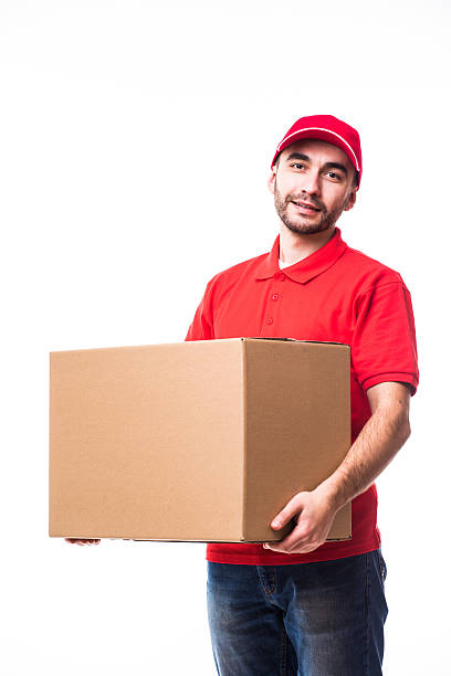 istock Side view of delivery man with box 638535728