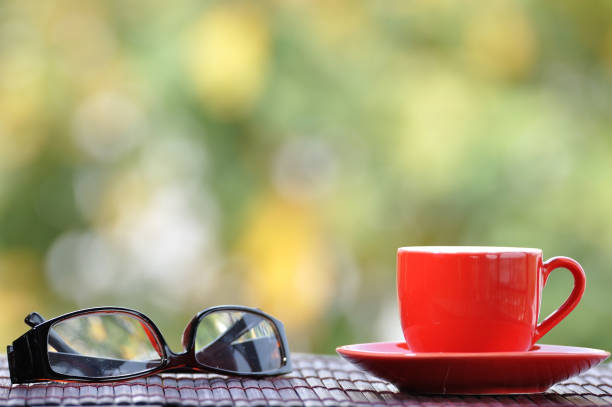 istock Relaxing time with red cup of coffee and eye glasses. 638535872