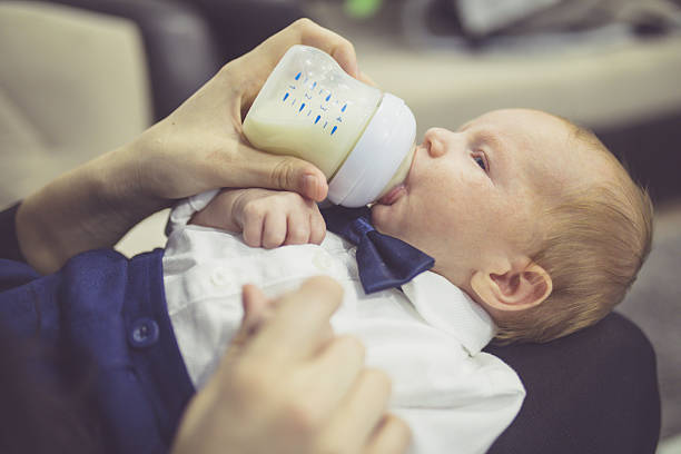 istock Mother is feeding newborn baby. 638536134