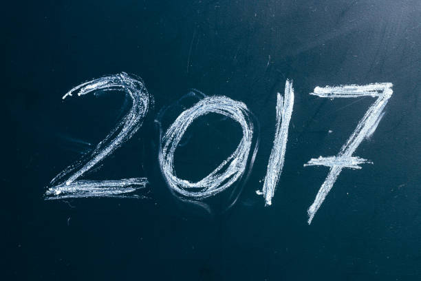 istock Year number 2017 written with the white chalk on the 638538084