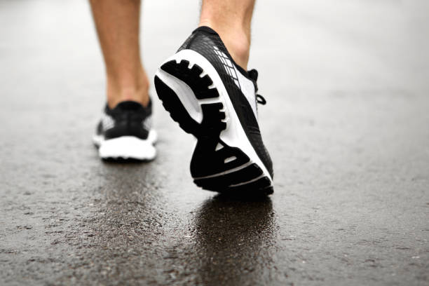 istock Sporty sneakers on street 638538956