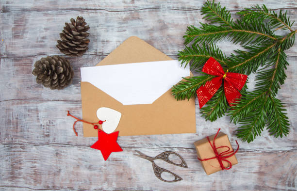 istock Envelope with blank sheet of paper on Christmas background 638540632