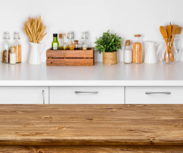 istock Brown wooden table with bokeh image of kitchen bench interior 638543686
