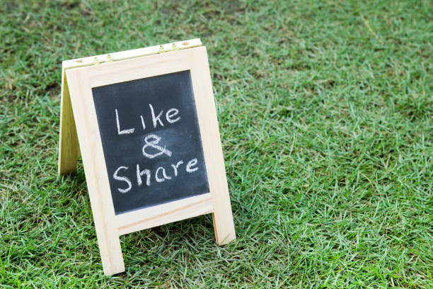 istock Blackboard with easel and wording like and share 638544368