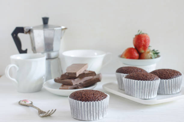 istock chocolate muffin in coffee time. 638546888