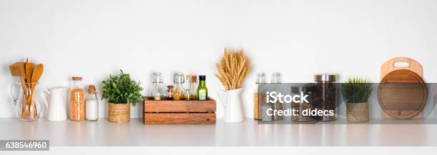 Kitchen Shelf With Various Herbs Spices Utensils On White Background Stock Photo - Download Image Now