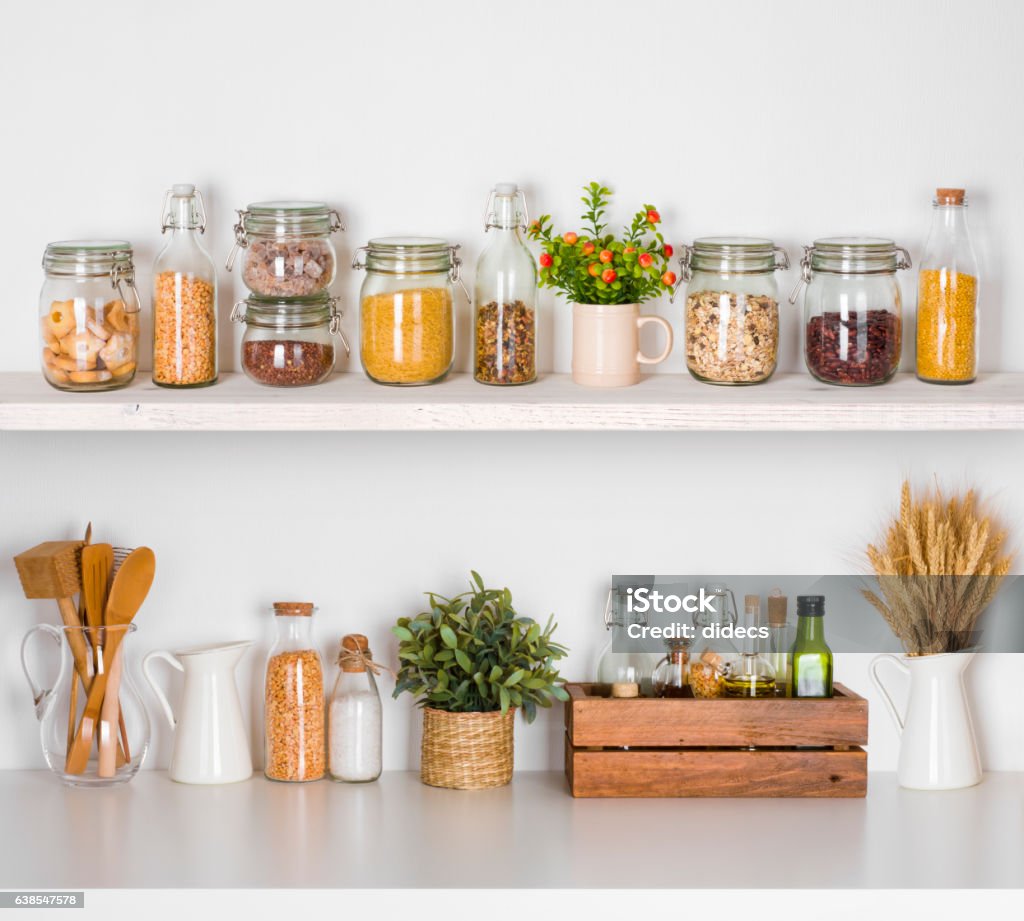 Modern kitchen shelves with various food ingredients on white background Kitchen Stock Photo