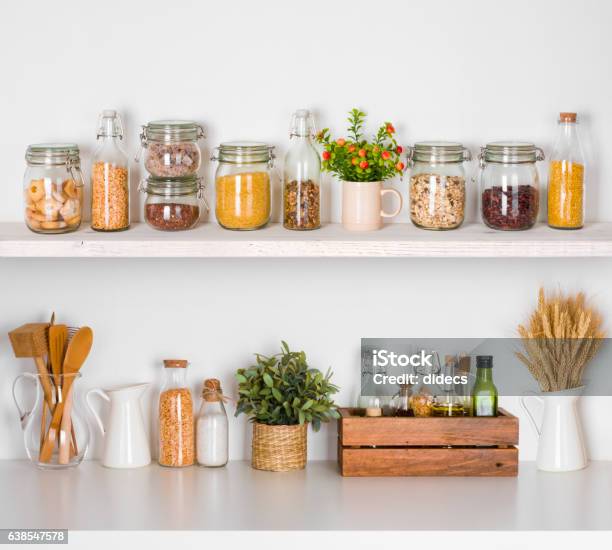 Modern Kitchen Shelves With Various Food Ingredients On White Background Stock Photo - Download Image Now