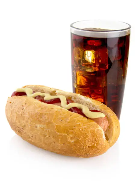 Photo of Hot dog with mustard,ketchup and cola isolated on white