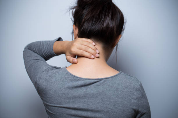 istock Woman has neck pain 638552048