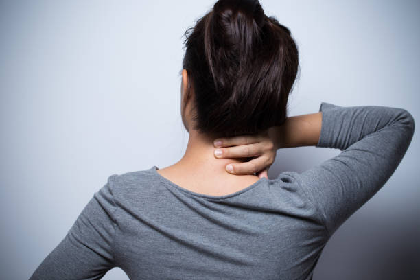 istock Woman has neck pain 638552458