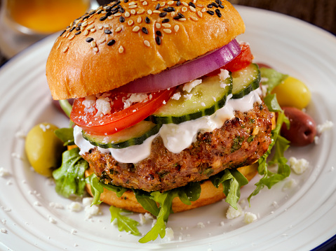 100% Lamb -Greek Burger with Arugula, Cucumber, Tomatoes, Feta and Tzatziki Sauce - Photographed on Hasselblad H3D2-39mb Camera