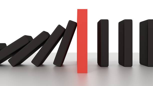 istock Falling Domino Row With Red Stop Piece On The Desk 638554988