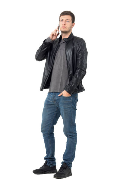 istock Confident man wearing leather jacket on the phone 638560618