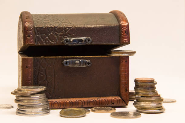 An Old Chest with Coins seen from the Side