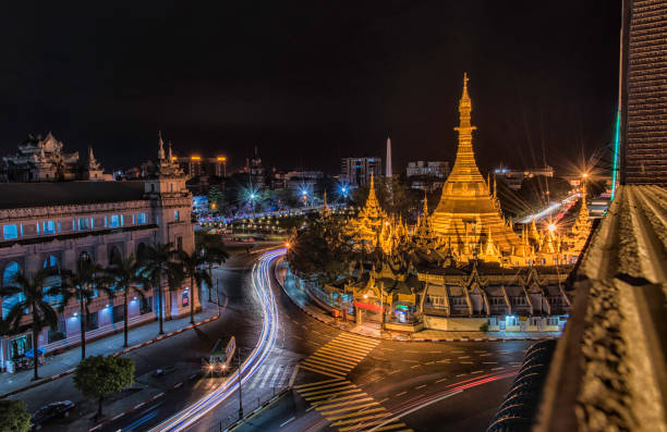 istock Sule Pagoda with traffic light at night. 638562710