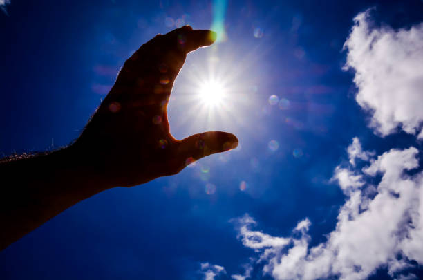 istock Hand over the Sky and Sun 638563392