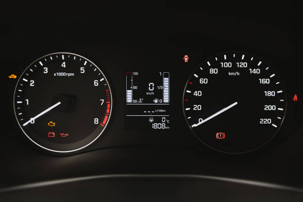 Car instrument panel, dashboard closeup Car instrument panel, dashboard closeup with visible speedometer dashboard close up speedometer odometer stock pictures, royalty-free photos & images