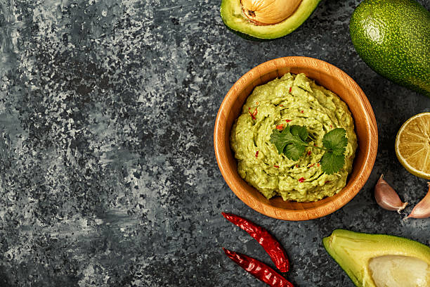 istock Homemade guacamole with ingredients. 638566248