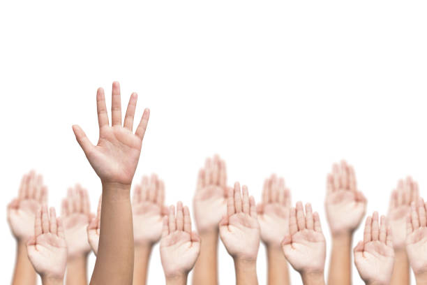 istock business crowd raising hands, many hands raise high up 638568602