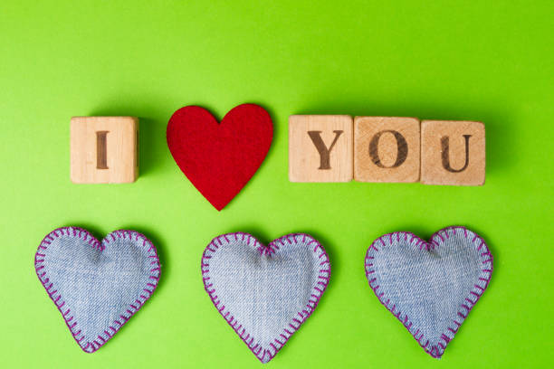 istock Valentine hearts of jeans and rustic alphabet blocks that spell 638568680