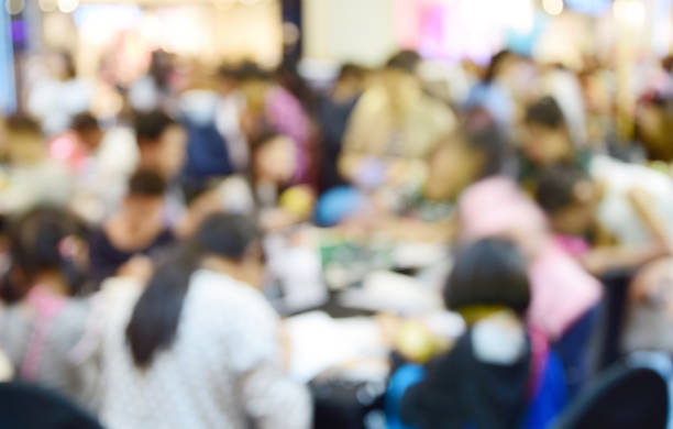 istock Businessmen and women blur in work conference. 638570644