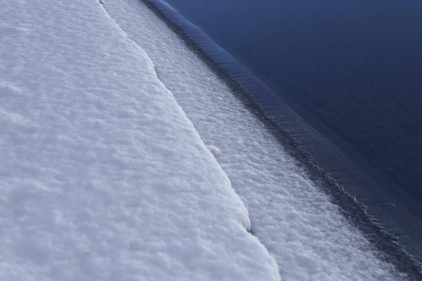 istock Snow beach at night. Beach covered with snow. 638571270