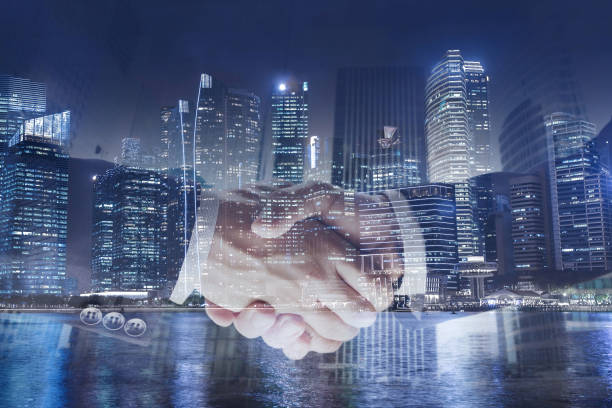 istock deal or agreement business concept, handshake double exposure 638571724