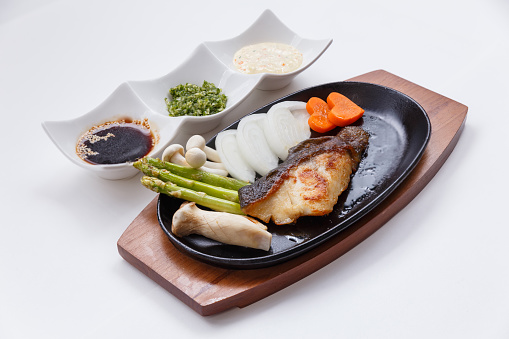 Grilled Japanese Sablefish Steak with Mushroom, Asparagus, Sliced Onion and Carrot with Soy Sauce. Scallion Sauce and Mayonnaise.