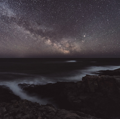 Our home galaxy rises over a rugged stretch of Nova Scotian coastline.  Long exposure.
